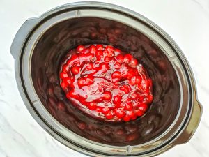 Pour Cherries into Crockpot
